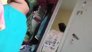 Grandmother wearing blouse and showing naked boobs