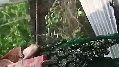 Village neighbor girl outdoor bath caught through hole