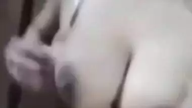 Beautiful girl making striping video for lover