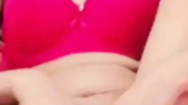 Young Indian girl’s stripping video call sex video