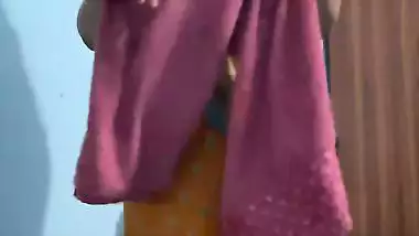 Curvaceous Indian girl removing saree and nude show