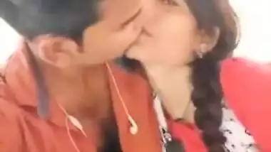 Handsome young man paws Indian's perfect boobs through red dress
