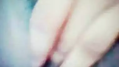 Girl of Indian origin massages XXX muff showing off her naked hooters