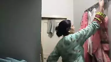 Mom changing dress caught on camera by horny son